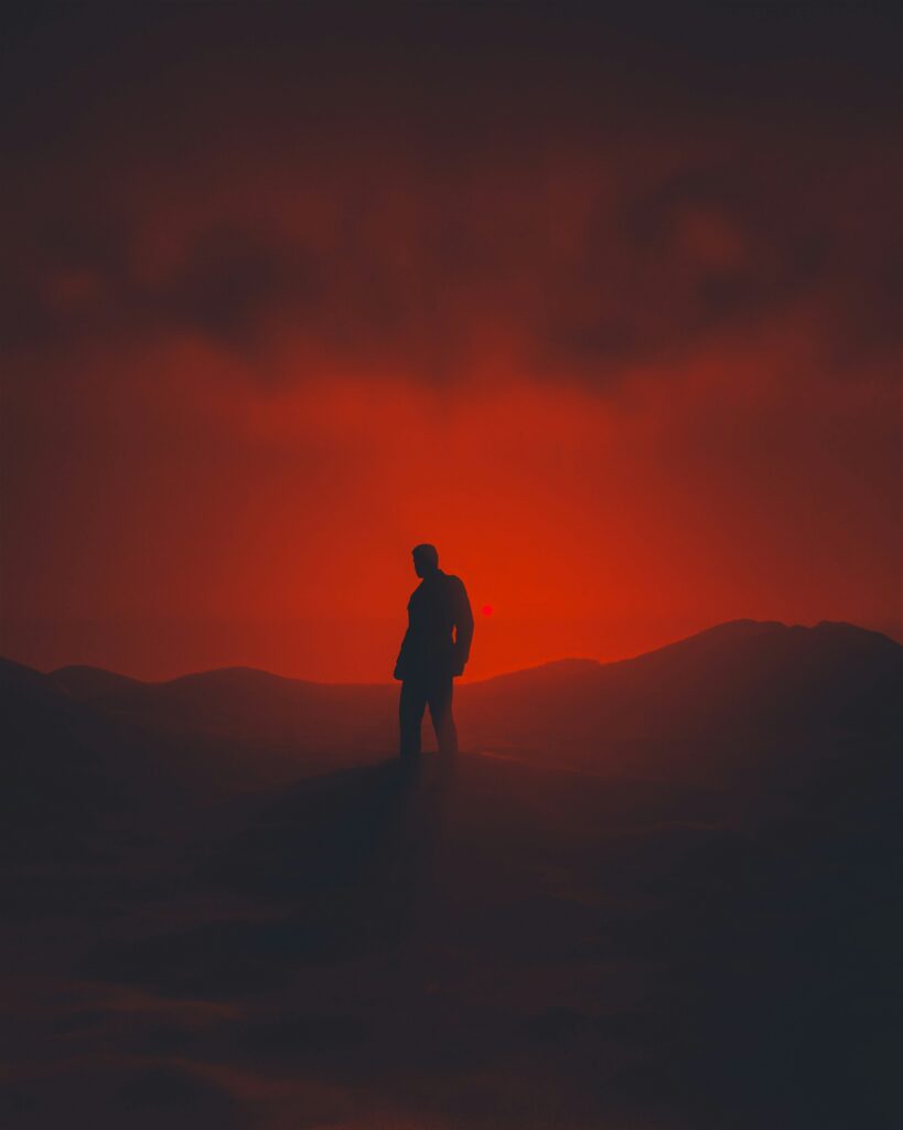 alcohol recovery dad UK standing tall at sunrise after transformation